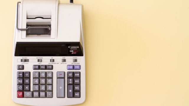 white Canon cash register